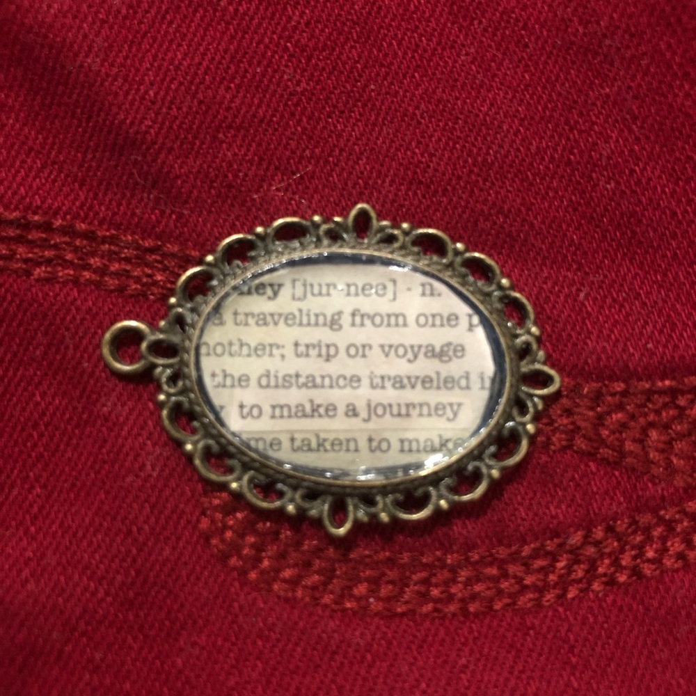 Oval Glass Pendant Necklace in Silver Tone - Text Print Accent